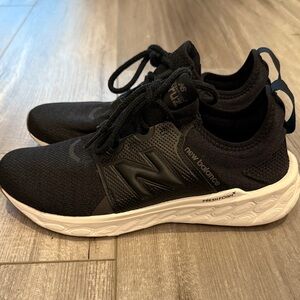 New Balance Women’s Black and White Sneakers